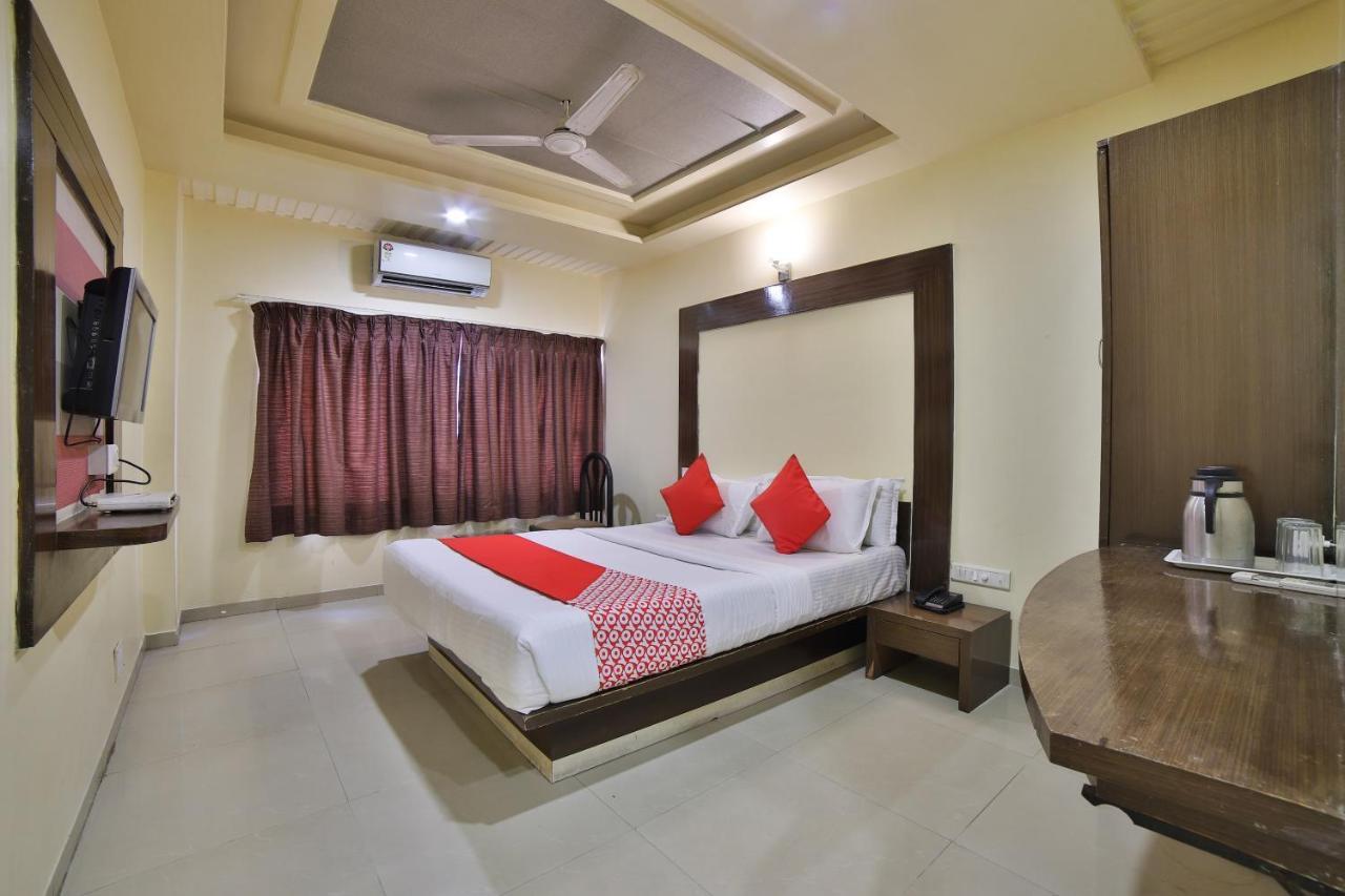 Capital O Kalash Residency Ахмедабад Экстерьер фото