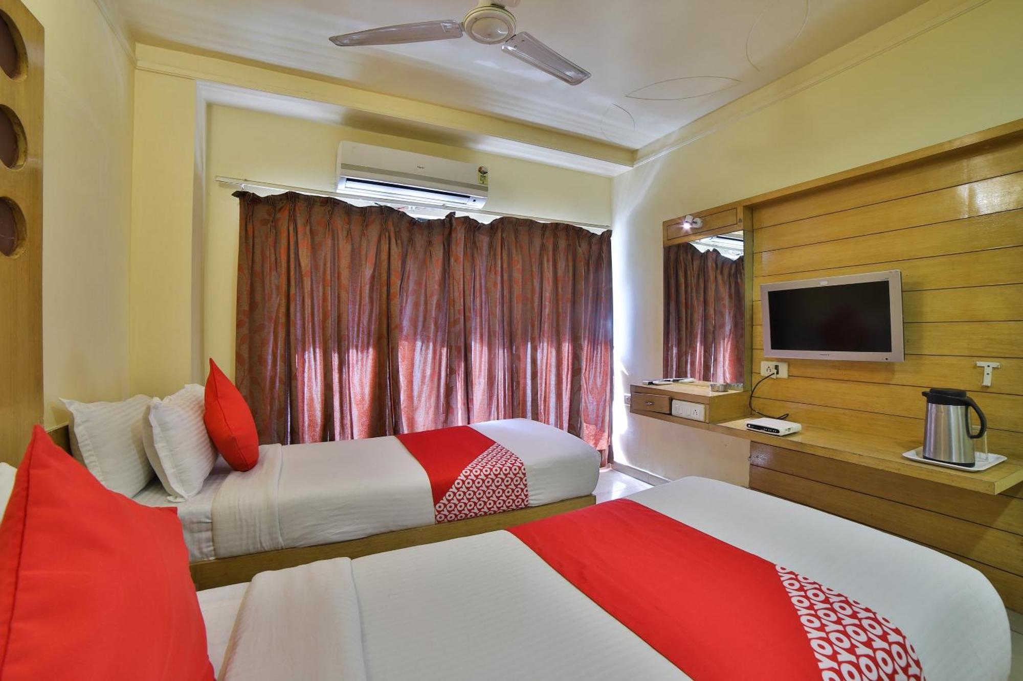 Capital O Kalash Residency Ахмедабад Экстерьер фото